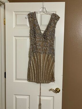 Sherri Hill Nude Midi with Silver Crystal Embellishment.